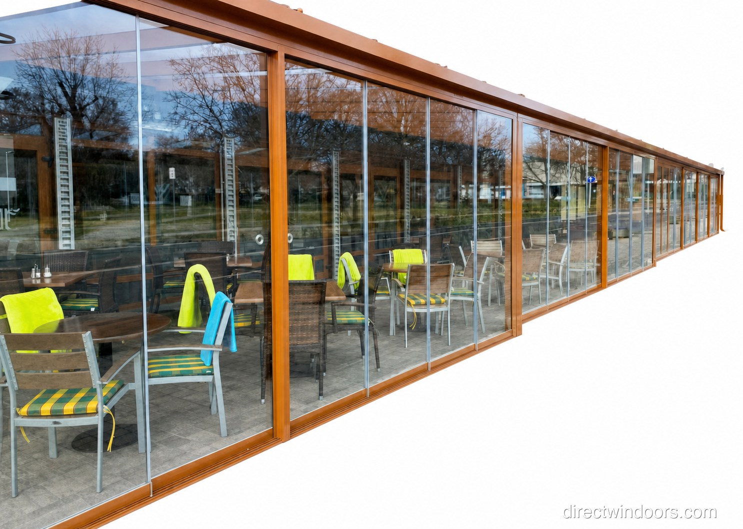 Frameless glass walls on a café exterior with open storefront