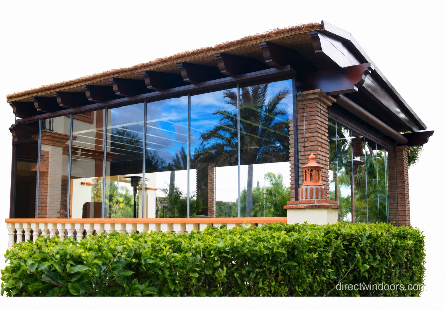 Frameless glass walls under a pergola at an outdoor restaurant